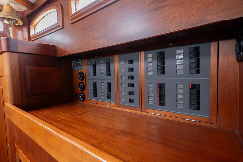  Yacht Photos Pics Wooden interior of 2011 Spirit 50 DH yacht with control panels.