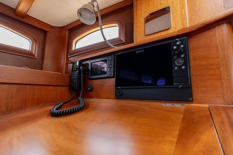  Yacht Photos Pics Wooden interior of 2011 Spirit 50 DH yacht with navigation equipment.