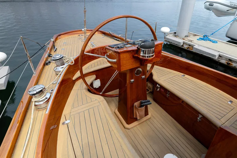  Yacht Photos Pics Elegant 2011 Spirit 50 DH yacht cockpit with wooden steering wheel and polished deck.