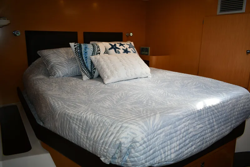 Beach Cat Yacht Photos Pics Luxurious bedroom interior of 2012 Fountaine Pajot 40 yacht with cozy bedding.