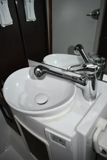 Beach Cat Yacht Photos Pics Bathroom sink with modern faucet on 2012 Fountaine Pajot 40 yacht.