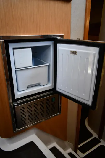 Beach Cat Yacht Photos Pics Small freezer inside 2012 Fountaine Pajot 40 yacht, open door, compact design.