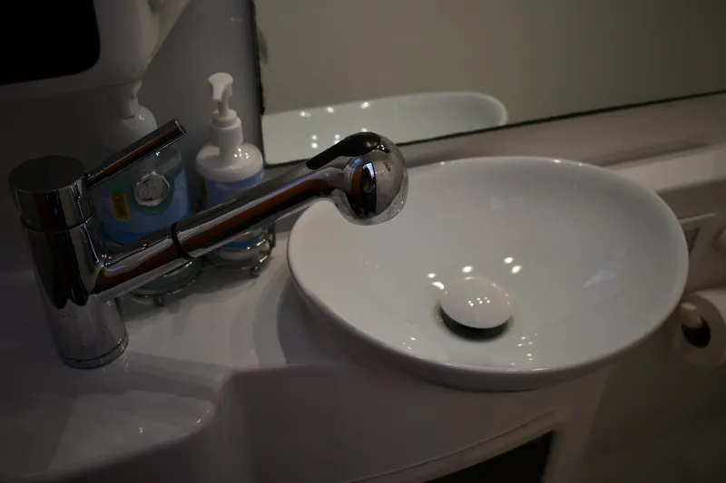 Beach Cat Yacht Photos Pics Modern bathroom sink with chrome faucet on a 2012 Fountaine Pajot 40 yacht.