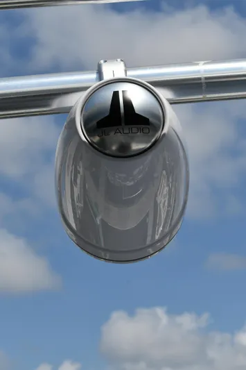 Beach Cat Yacht Photos Pics JL Audio speaker on Fountaine Pajot 40 catamaran, 2012, against a blue sky.