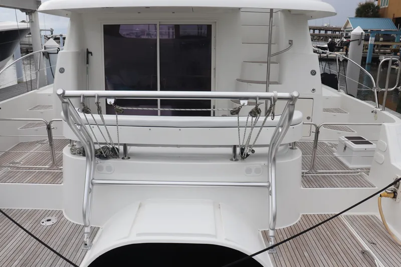 Beach Cat Yacht Photos Pics Rear view of 2012 Fountaine Pajot 40 catamaran docked at marina.
