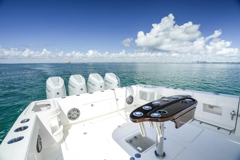  Yacht Photos Pics 2024 SeaVee 400Z boat with multiple outboard engines on open water.