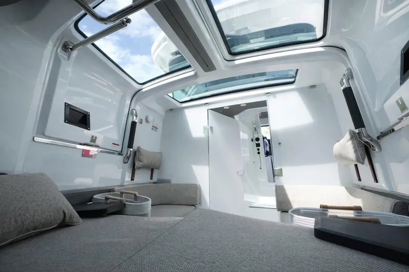  Yacht Photos Pics Interior of 2022 Axopar 37 XC Cross Cabin with modern design and skylight.