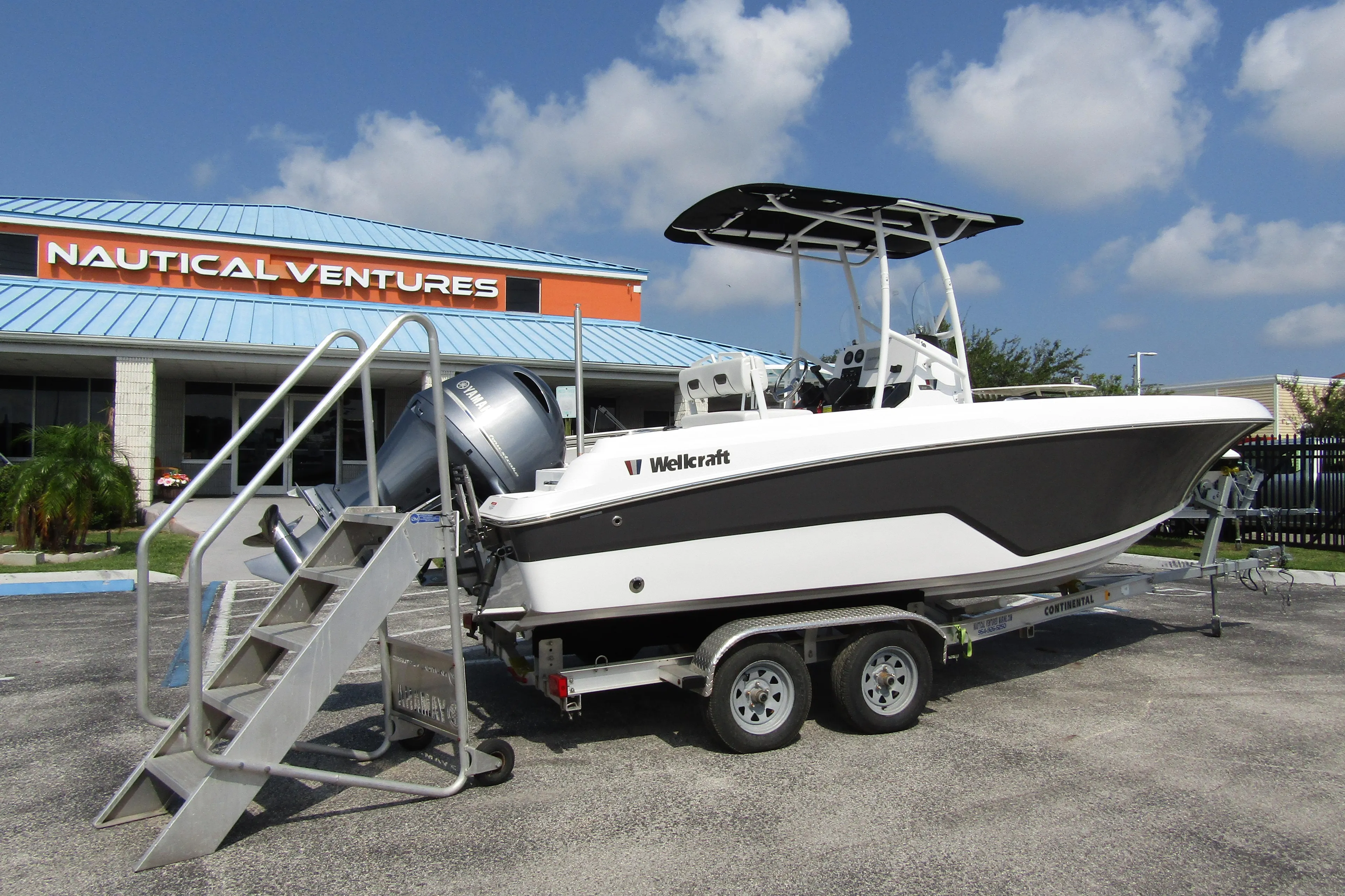 2024 Wellcraft 202 Fisherman boat on trailer at Nautical Ventures dealership.