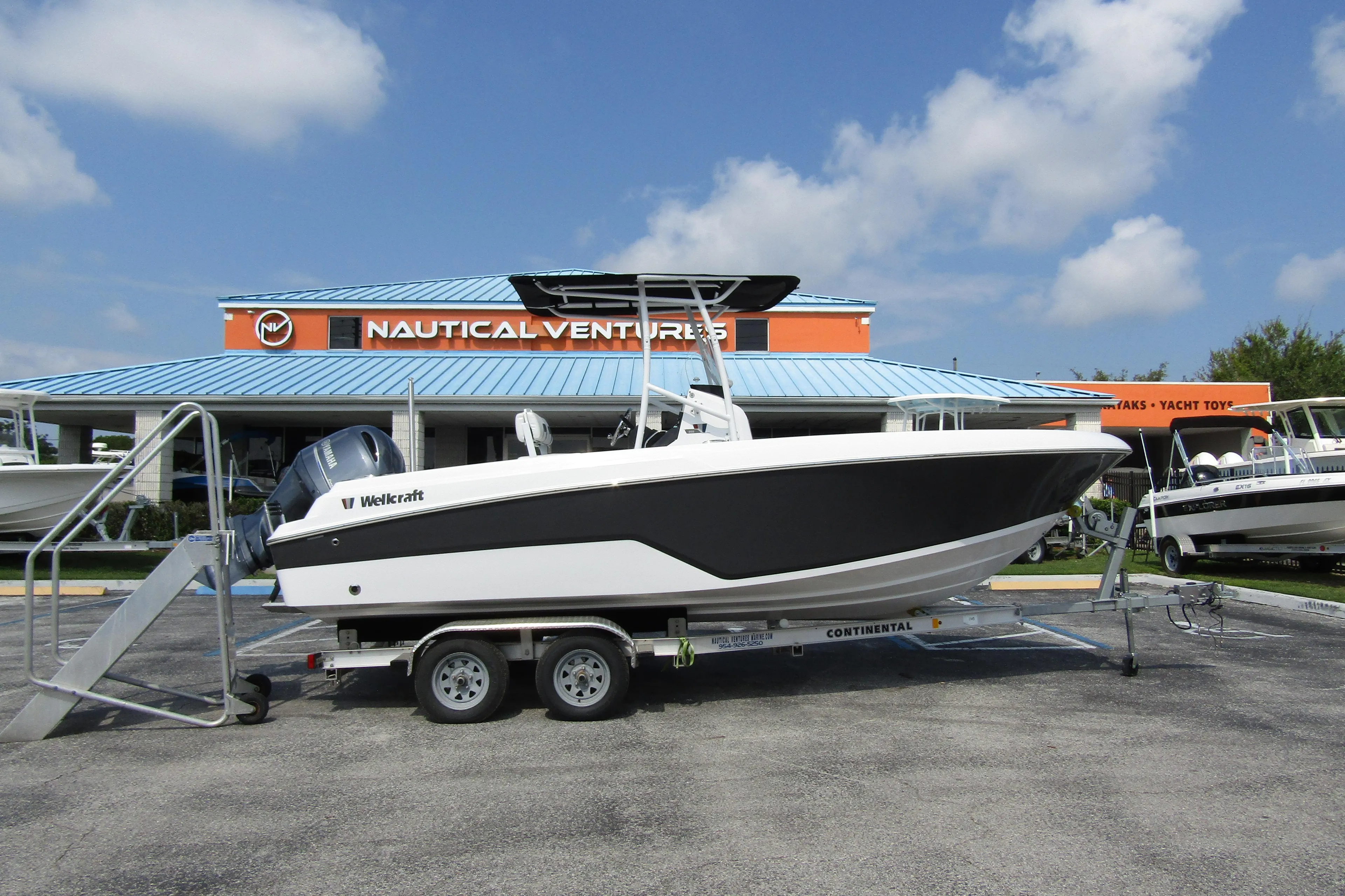 2024 Wellcraft 202 Fisherman boat on trailer at Nautical Ventures dealership.