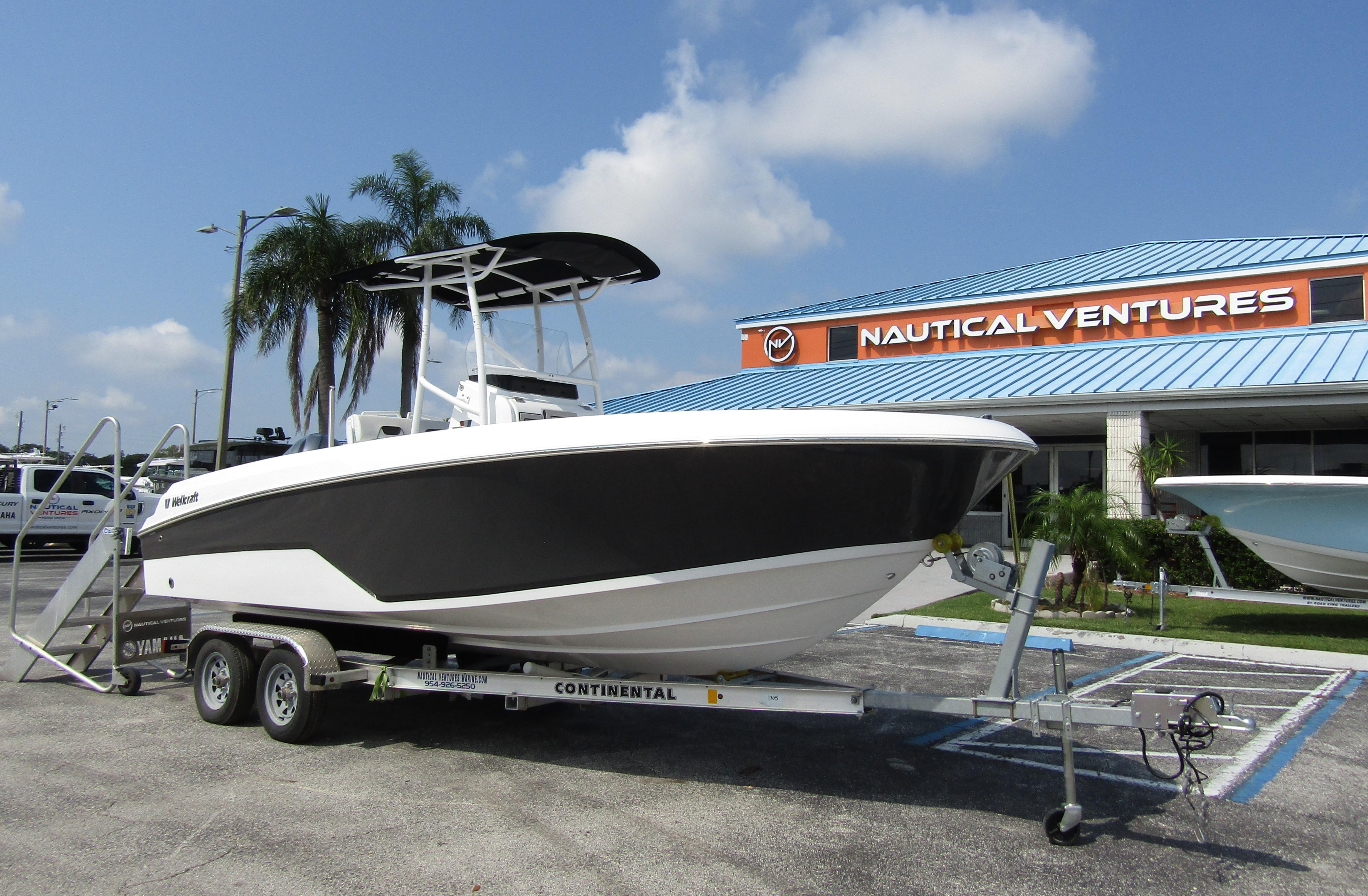 2024 Wellcraft 202 Fisherman boat on trailer at Nautical Ventures dealership.