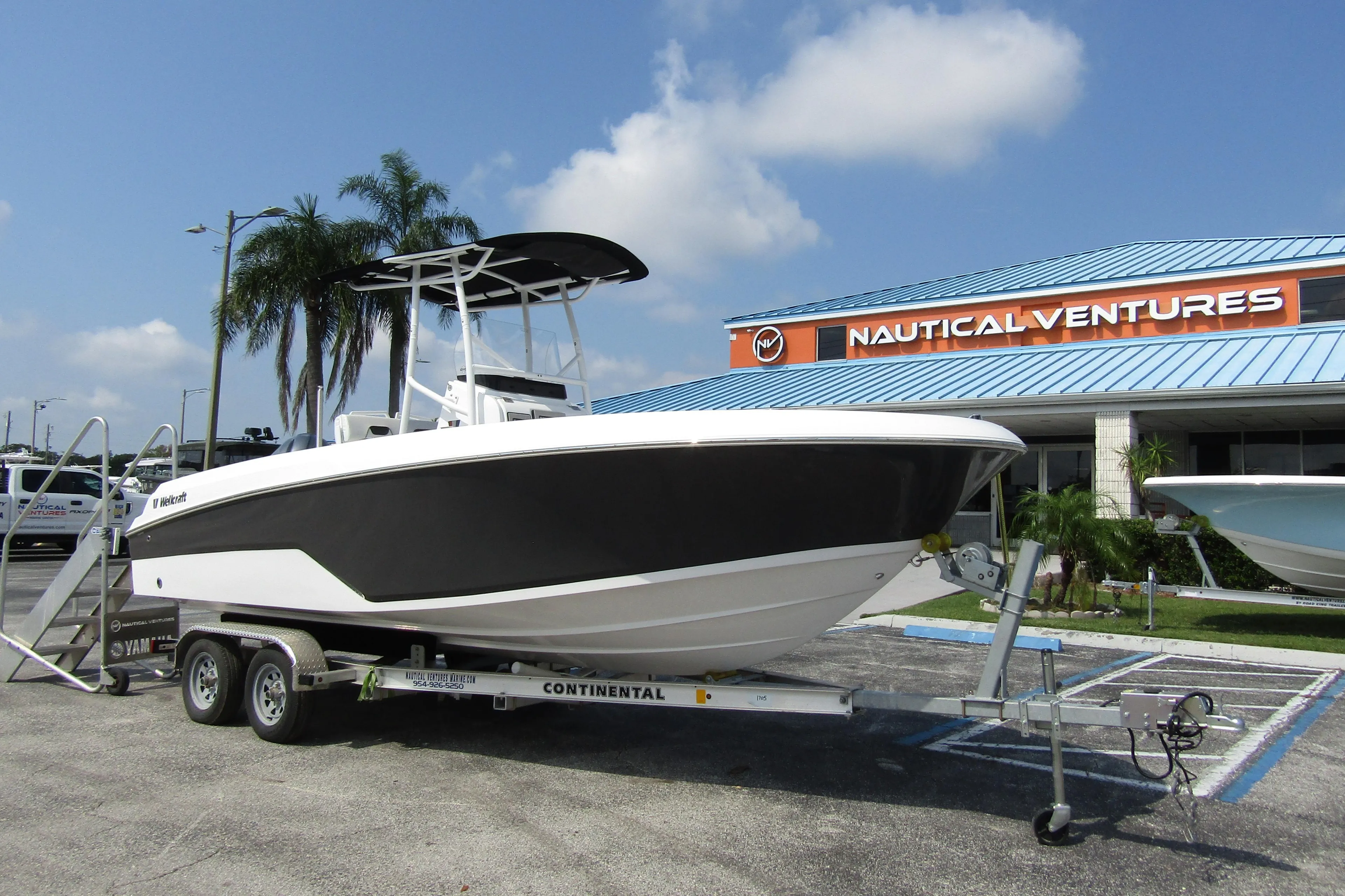 2024 Wellcraft 202 Fisherman boat on trailer at Nautical Ventures dealership.