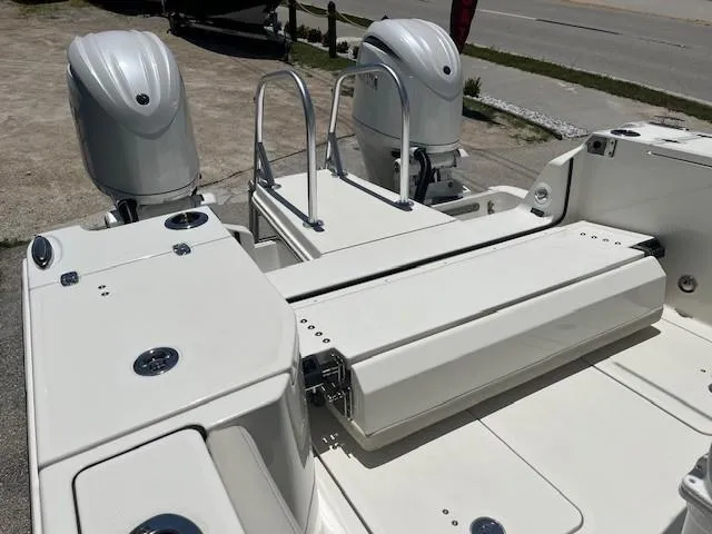  Yacht Photos Pics 2024 World Cat 260 CC-X boat with dual outboard engines and swim platform.