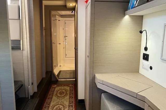 Paire De Jacques Yacht Photos Pics Interior of 2021 Fountaine Pajot Isla 40 catamaran, featuring a modern hallway and workspace.