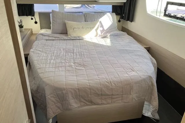 Paire De Jacques Yacht Photos Pics Cozy bedroom in 2021 Fountaine Pajot Isla 40 catamaran with elegant bedding.