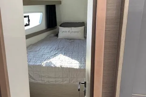 Paire De Jacques Yacht Photos Pics Cozy bedroom in 2021 Fountaine Pajot Isla 40 catamaran with window view.