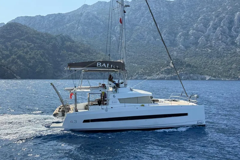  Yacht Photos Pics Sailing catamaran Bali 4.3, 2017 model, cruising in scenic coastal waters.