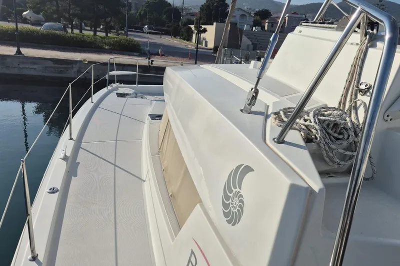  Yacht Photos Pics Bali 4.3 catamaran deck, 2017 model, docked by calm waters.