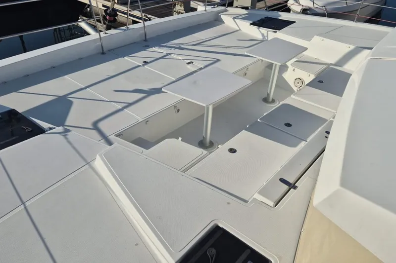 Yacht Photos Pics Spacious deck of 2017 Bali 4.3 catamaran with seating and tables.