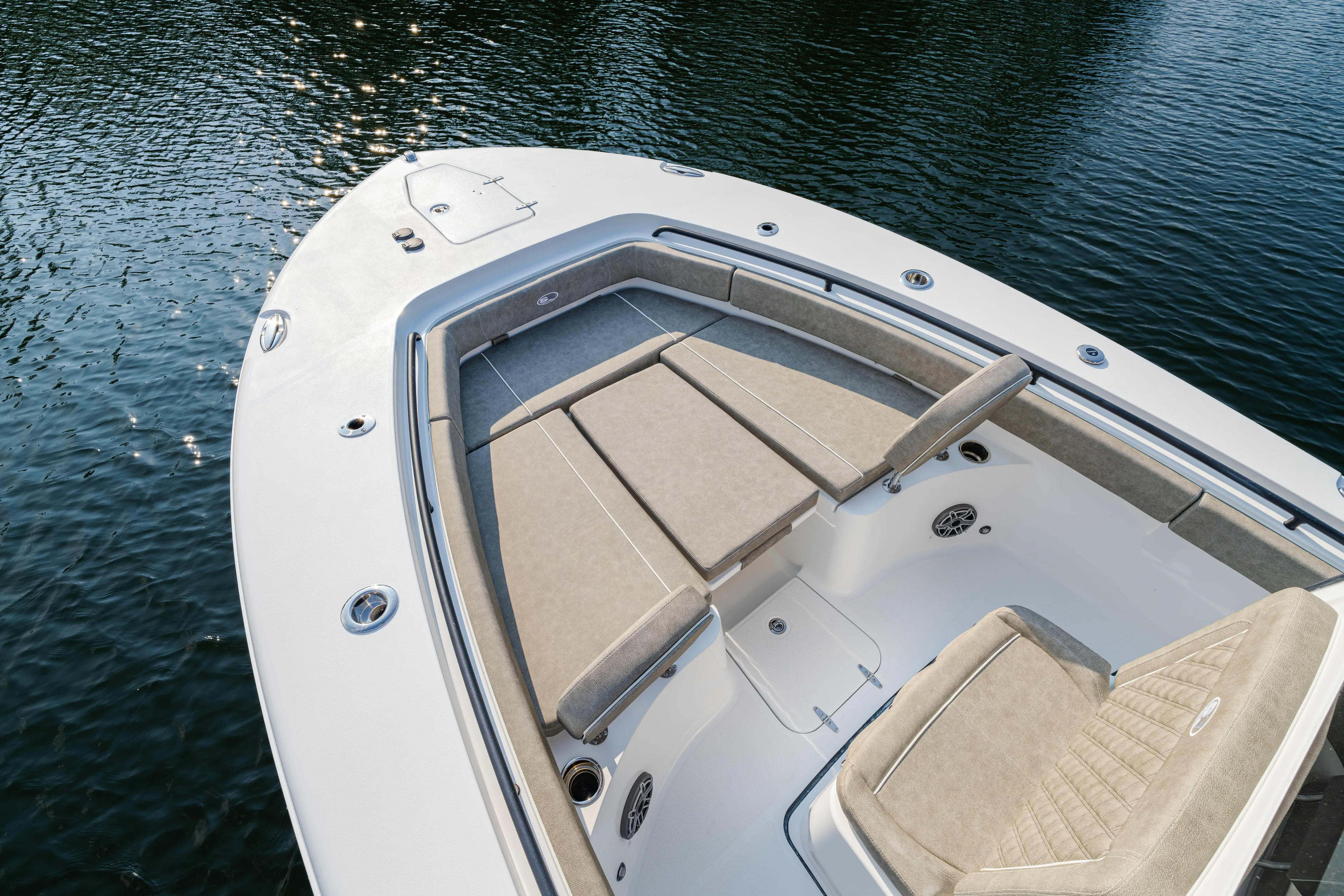  Yacht Photos Pics 2026 Sea Hunt Gamefish 25 boat with cushioned seating on calm water.