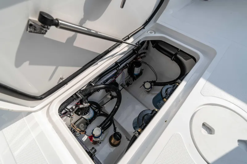  Yacht Photos Pics Open hatch of 2026 Sea Hunt Gamefish 25 showing internal components and wiring.