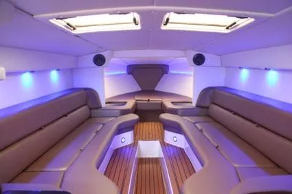  Yacht Photos Pics Luxurious interior of 2010 Nor-Tech 52 boat with ambient lighting and plush seating.