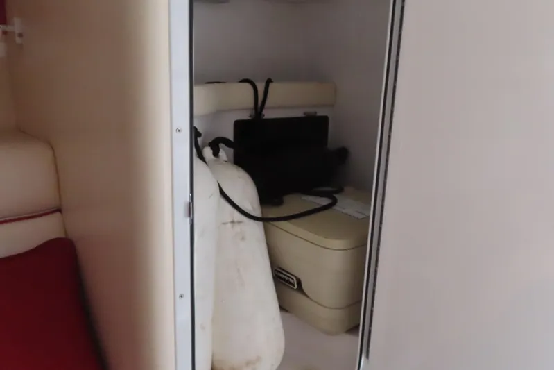  Yacht Photos Pics Interior of 2007 Donzi 35 ZR boat showing storage area and equipment.