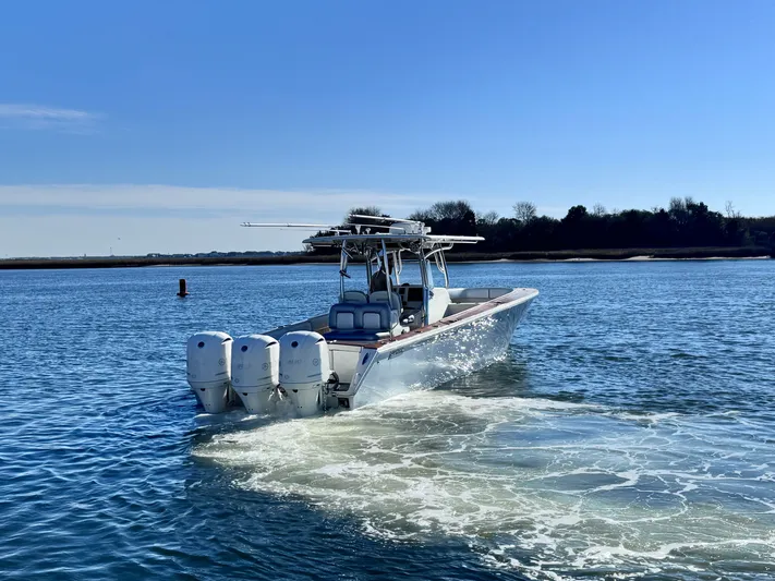  Yacht Photos Pics 2015 Jupiter 38 HFS boat on calm water.