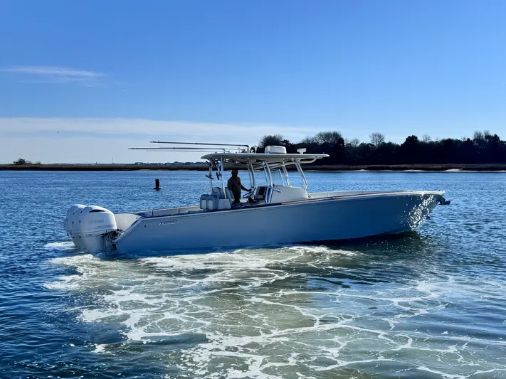  Yacht Photos Pics 2015 Jupiter 38 HFS boat on calm water.