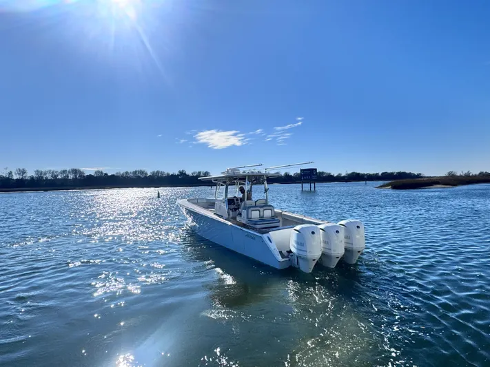  Yacht Photos Pics 2015 Jupiter 38 HFS boat on sunny waters.