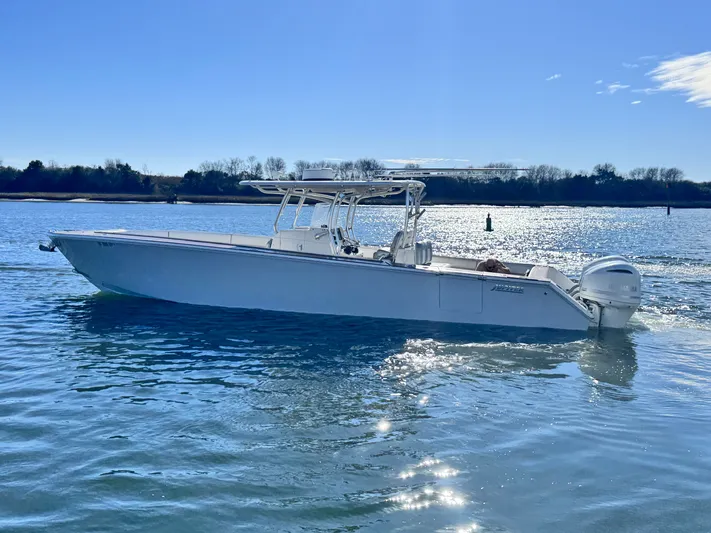  Yacht Photos Pics 2015 Jupiter 38 HFS boat on calm water.