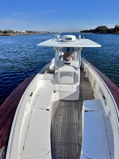  Yacht Photos Pics 2015 Jupiter 38 HFS boat cruising on calm waters.