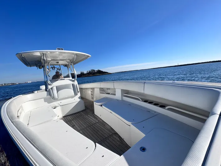  Yacht Photos Pics Jupiter 38 HFS 2015 boat on calm water under clear sky.