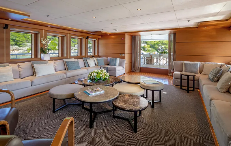 Zaliv III Yacht Photos Pics Luxurious Mondomarine 2011 yacht interior with elegant seating and scenic views.