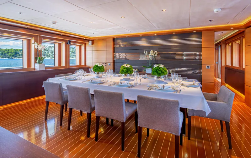 Zaliv III Yacht Photos Pics Luxurious dining area on 2011 Mondomarine Semi Displacement yacht, featuring elegant table setting.