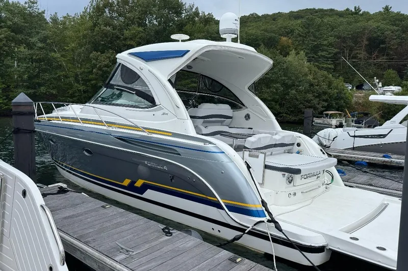  Yacht Photos Pics 2019 Formula 37 Performance Cruiser docked, featuring sleek design and modern amenities.