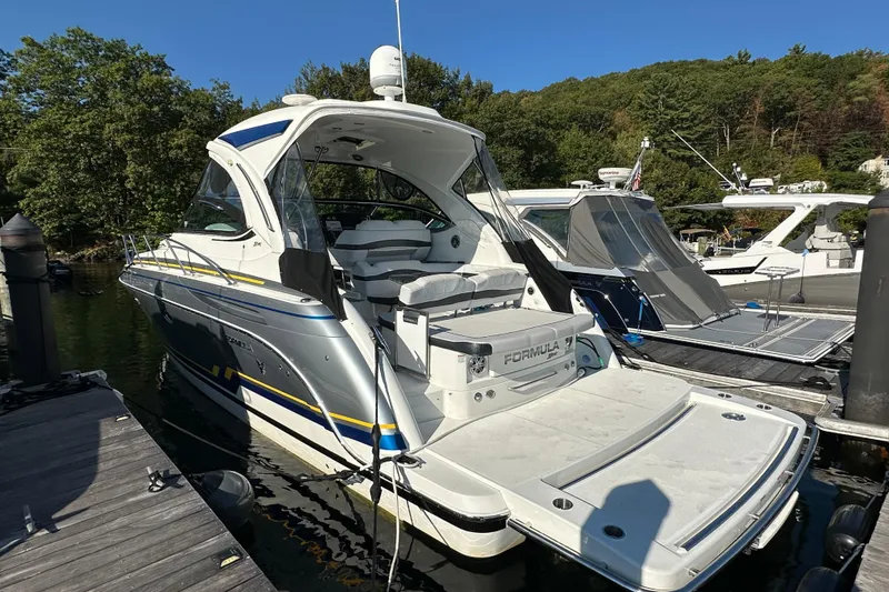  Yacht Photos Pics 2019 Formula 37 Performance Cruiser docked, featuring sleek design and modern amenities.