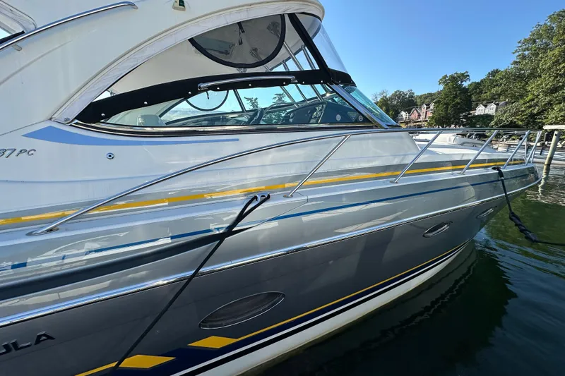  Yacht Photos Pics 2019 Formula 37 Performance Cruiser docked on a sunny day, showcasing sleek design.