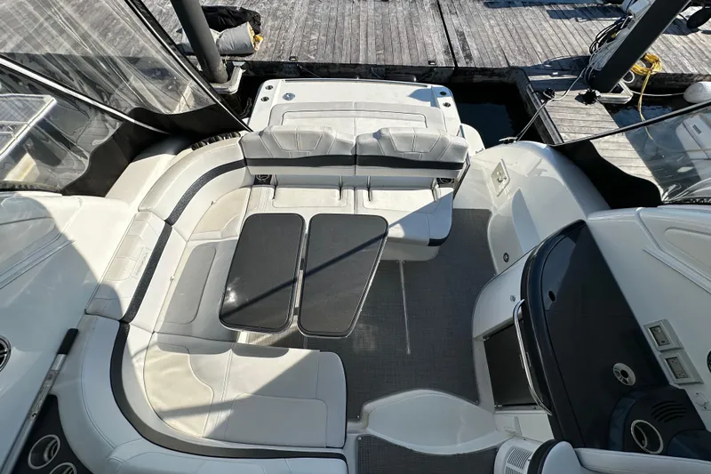  Yacht Photos Pics 2019 Formula 37 Performance Cruiser interior with seating and table, docked at marina.