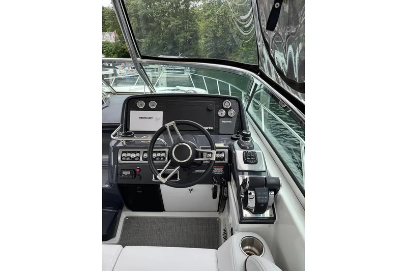  Yacht Photos Pics 2019 Formula 37 Performance Cruiser helm with modern controls and navigation equipment.