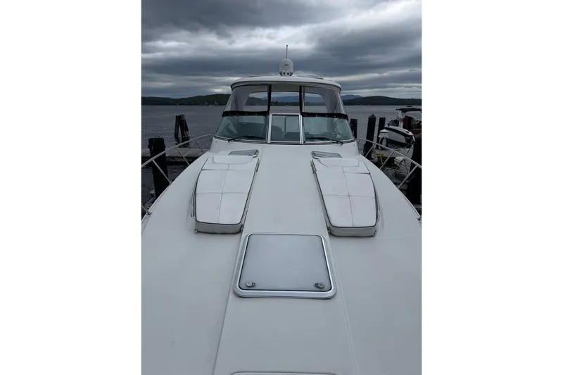  Yacht Photos Pics 2019 Formula 37 Performance Cruiser docked under cloudy skies.