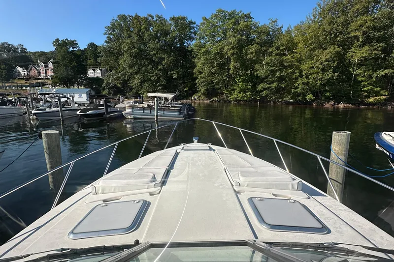  Yacht Photos Pics 2019 Formula 37 Performance Cruiser docked in a scenic marina setting.