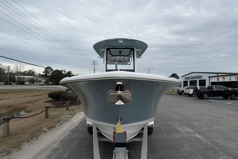  Yacht Photos Pics 2026 Sea Hunt Ultra 265 SE boat on trailer, outdoor showroom background.