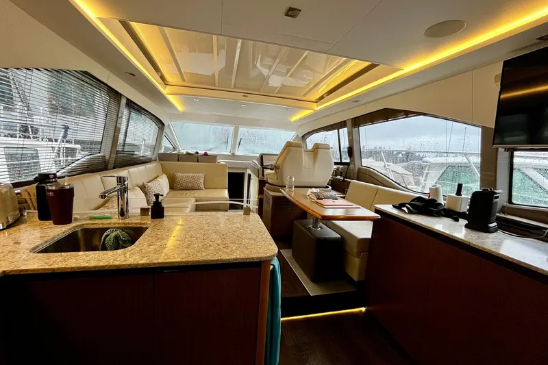 Empyrean Yacht Photos Pics Luxurious interior of 2019 Sea Ray Sundancer 460 yacht with modern amenities and elegant design.