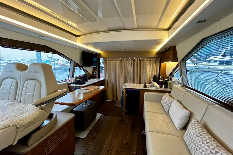 Empyrean Yacht Photos Pics Luxurious interior of 2019 Sea Ray Sundancer 460 yacht with elegant seating and modern amenities.