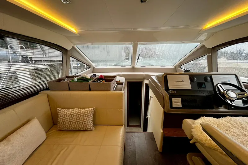 Empyrean Yacht Photos Pics Luxurious 2019 Sea Ray Sundancer 460 yacht interior with plush seating and modern helm.