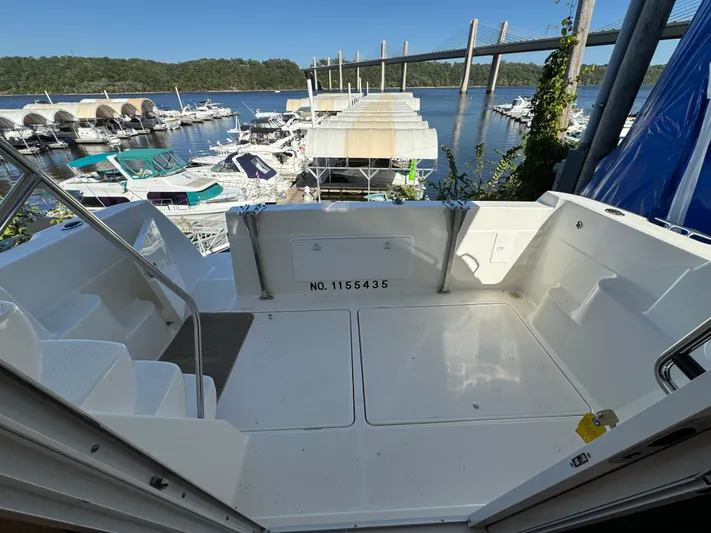 Baby Cake Yacht Photos Pics 2004 Meridian 381 Sedan yacht docked at marina with scenic waterfront view.