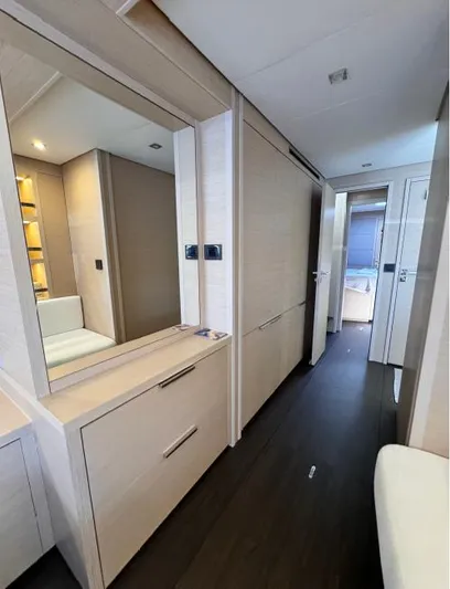  Yacht Photos Pics Interior of 2023 Lagoon 55 yacht, featuring modern design and sleek wood finishes.