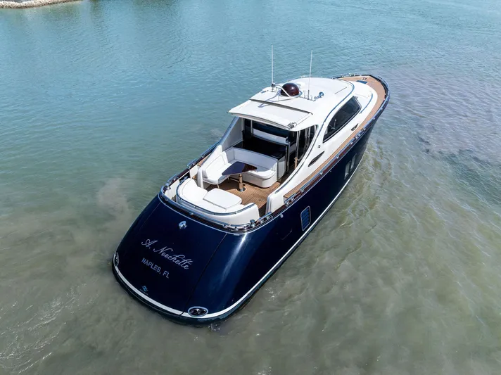 A. Noochette Yacht Photos Pics 2024 Zeelander Z5 luxury yacht on calm water, rear view.