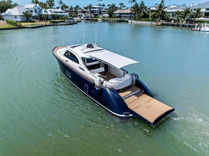 A. Noochette Yacht Photos Pics 2024 Zeelander Z5 luxury yacht cruising in a serene waterfront setting.