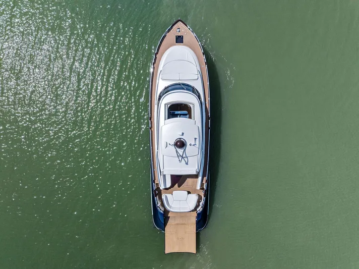 A. Noochette Yacht Photos Pics Aerial view of 2024 Zeelander Z5 yacht on calm green water.